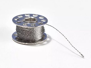 Fil de cosir conductor